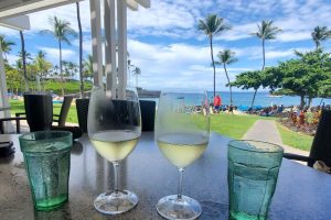 Napua restaurant wine glasses beach baackground